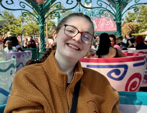 A photo of Nicole on the spinning teacups ride